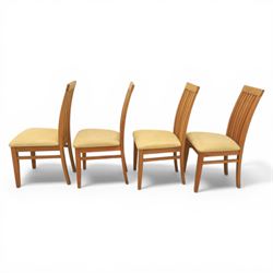 Contemporary teak dining suite comprising extending table and eight chairs, the table with rectangular plank top and one additional leaf extending to 210cm, supported on square tapering legs, the chairs with tall slatted backs and cream upholstered seats