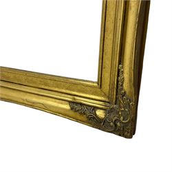 Gilt framed wall mirror, moulded frame decorated with foliate cartouches, bevelled mirror plate 