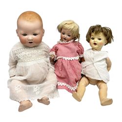 Heubach Koppelsdorf Germany bisque head doll with applied hair, sleeping eyes, open mouth with teeth and composition body with jointed limbs; marked 'Heubach Koppelsdorf 342.6/0 Germany' H34cm; Armand Marseille bisque head baby doll with moulded hair, sleeping eyes, open mouth and composition body with jointed limbs; marked 'A.M. Germany 351./8.K.; and BND London all composition doll (3)