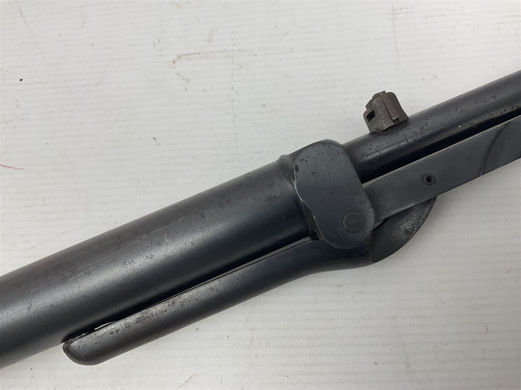 Early 20th century BSA Standard .177 Cal. Air Rifle (No.1), early A prefix number A67, with blued finish, top-loading, push-button underlever action, walnut semi-pistol grip stock with chequered BSA logo L101cm overall; with contemporary canvas case; NB: AGE RESTRICTIONS APPLY TO THE PURCHASE OF AIR WEAPONS.