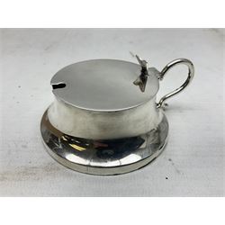 Early 20th century silver mustard pot and cover, with blue glass liner, hallmarked Hawksworth, Eyre & Co Ltd, Sheffield 1911, approximate silver weight 59.4 grams