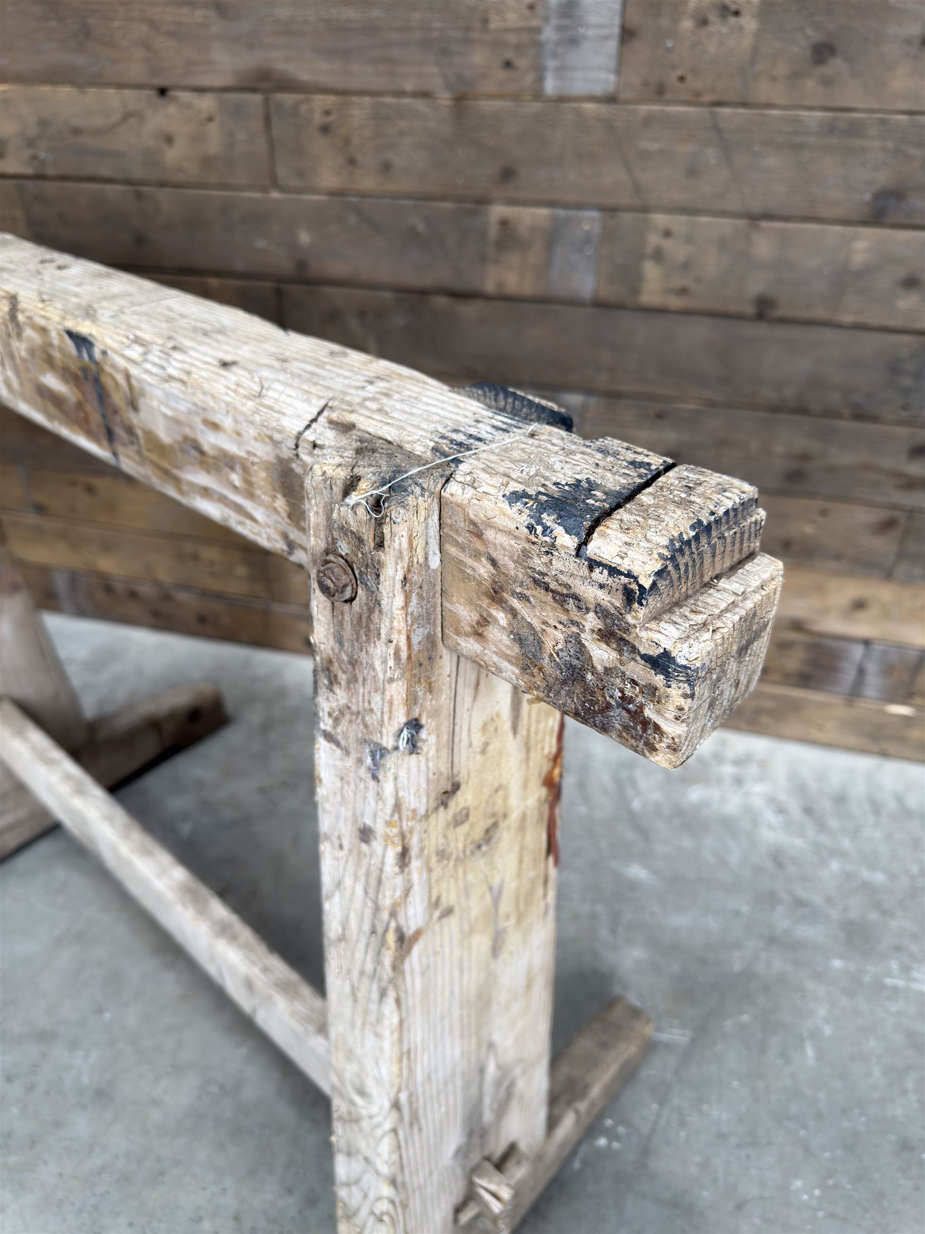 Pair of late 19th century pitch pine trestles, square tapering form in stripped finish