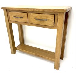 Light oak sidetable, two drawers, stile supports joined by solid under tier 