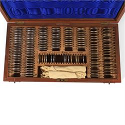 Holborn Surgical Instrument Co. Ltd set of opticians testing lenses, in fitted wooden box
