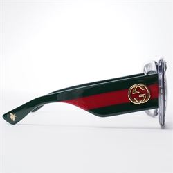 Gucci - pair of oversized black acetate sunglasses, the square frames with studded and crystal embellishment to the front and signature green and red web temples with interlocking gold-tone GG logo and bee motif, unused with original velvet pouch and box
