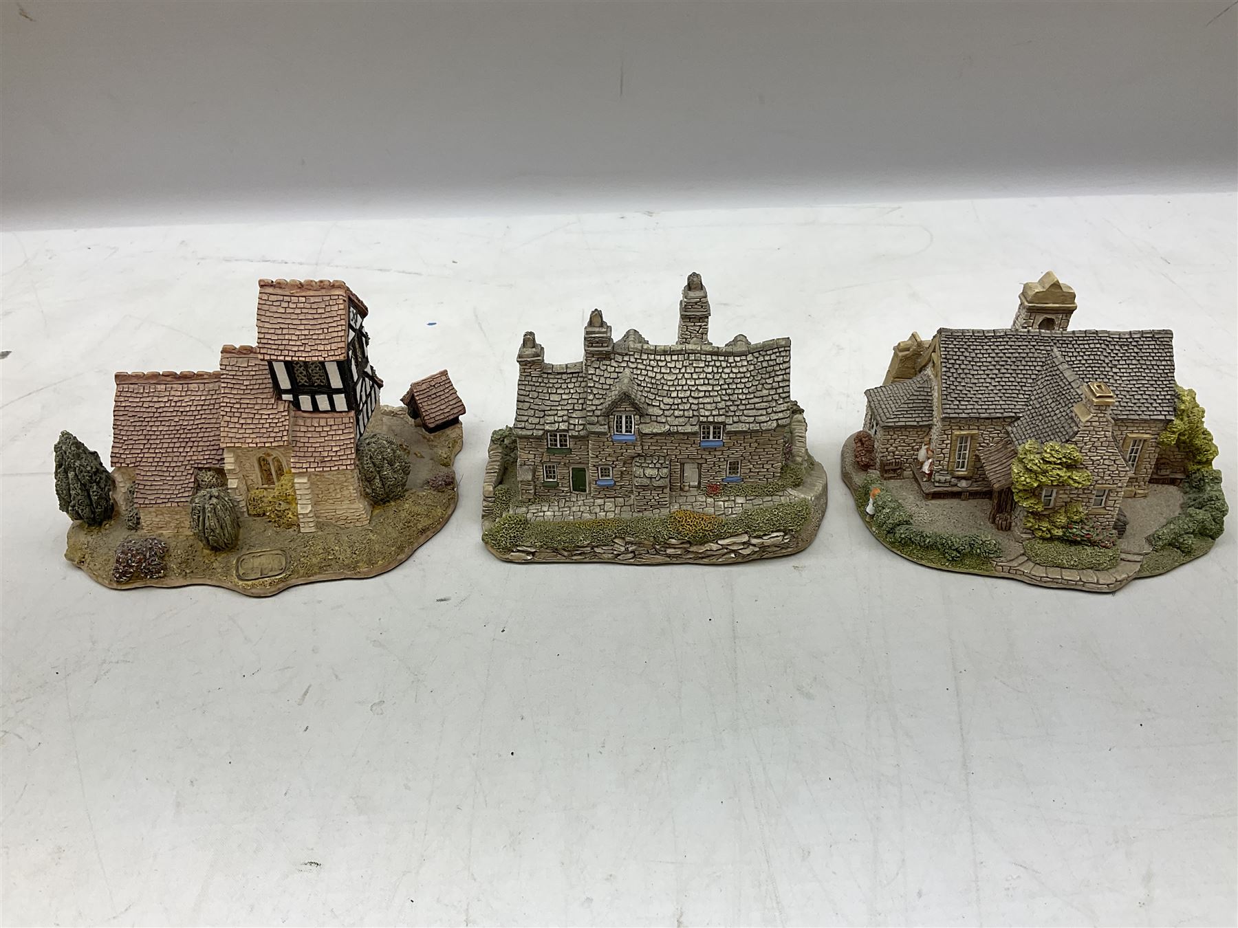 Eleven Lilliput Lane models, to include St Marks, Rose Cottage, Puffin Row, Village School, Swan Inn etc, all boxed