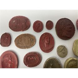 Large and impressive collection of Grand Tour cameos and intaglios (impronte), mostly red plaster examples