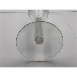 Set of three 18th century style wine glasses, each with funnel bowl etched with fruit vine, upon a double series air twist stem and circular foot, H17cm