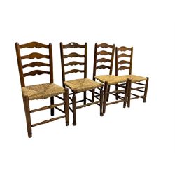 Harlequin set of nine country elm and beech chairs - pair 19th century spindle back carver armchairs with wingbacks, and a mixed set of seven ladderback side chairs, all with rush seats