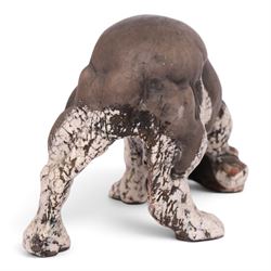 Keza Rudge (British 1966-): raku fired studio pottery sculpture of sniffing dog, H17cm