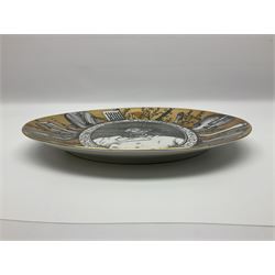 Fornasetti Grandi Maestri plate, depicting Giuseppe Verdi within a border of operatic emblems on gilt ground, with printed mark beneath, D25cm