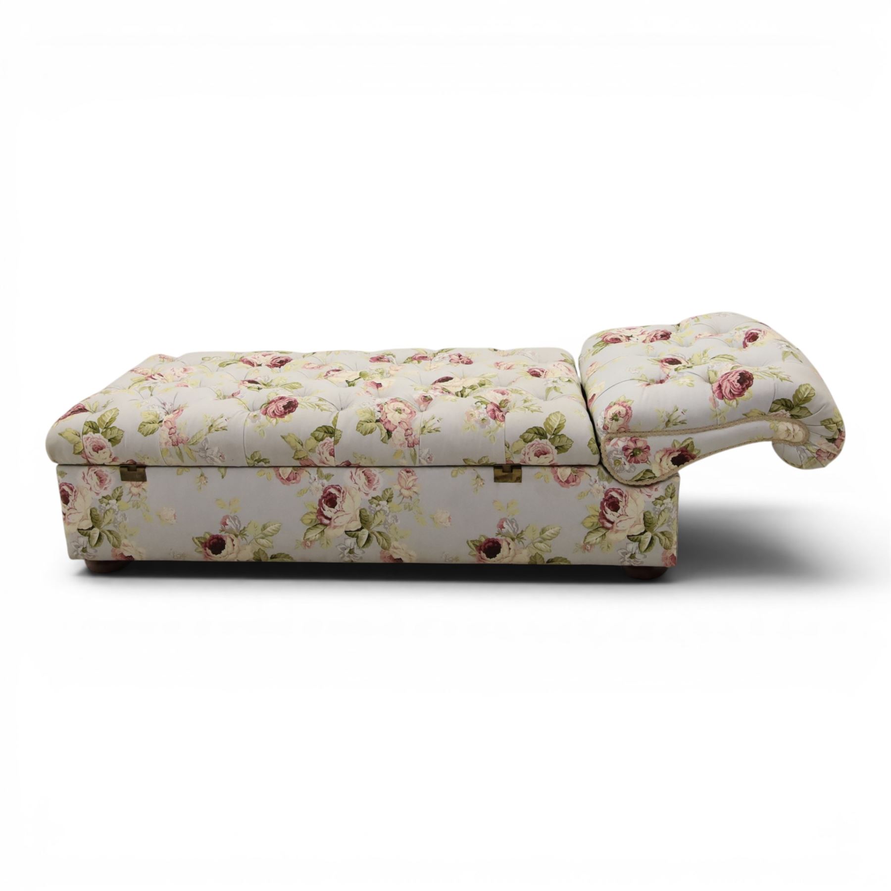 Traditional design scroll end chaise longue Ottoman, floral upholstered buttoned seat hinged to reveal a red lined interior, with reclining scroll end, raised upon squat bun feet