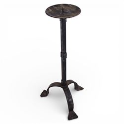 Black metal four branch candelabra, H56.5cm, together with a wrought iron style picket candlestick upon three feet, H45.5cm, and a further four branch example, H39cm