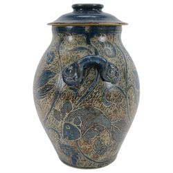 John Egerton (c1945-): studio pottery stoneware vase and cover, decorated with fish and ammonites upon a blue ground, H38cm