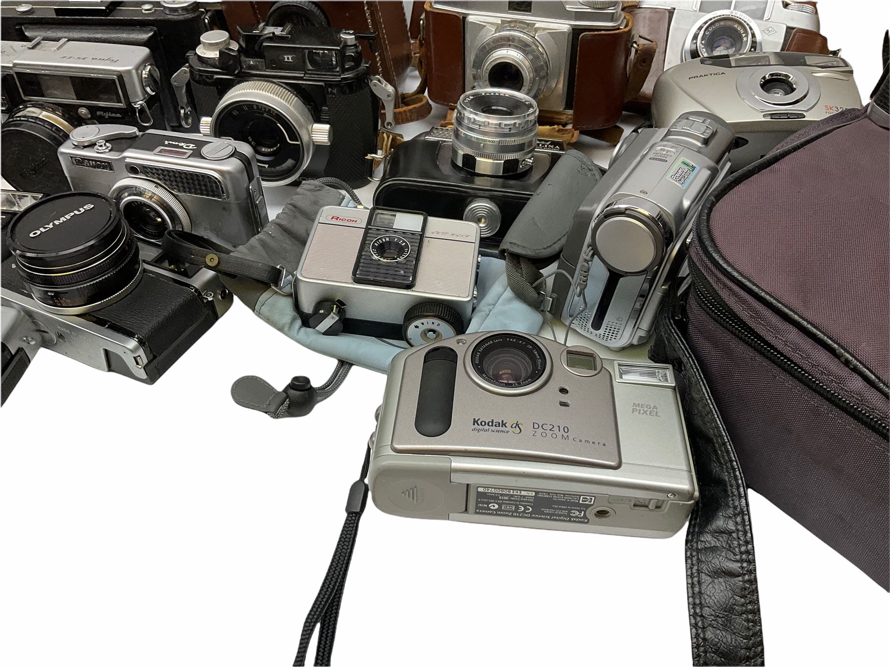 Collection of cameras, to include three Olympus Trip 35,  Balda Super Baldax, Seagull 4A TLR Camera, Pentax MG, Pentax-MV1, Yashica, two Yashica Electro 35, Rollei B35, Fujica 35 EE etc. 