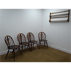  Set four Ercol hoop back chairs (W43cm) and an Ercol wall rack  