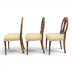 Bevan Funnell Reprodux - Regency design set of ten mahogany dining chairs, oval backs with central splat with rose motif, serpentine seat upholstered in damask fabric, raised on turned supports