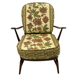 Ercol - Pair of mid-20th centur medium elm framed easy chairs, with loose patterned covers with folate design