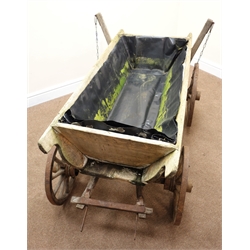  Early 20th century pitch pine dog cart, four metal bound wheels, L152cm  