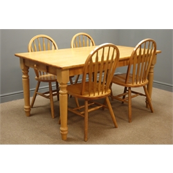  Light wood rectangular dining table, single drawer, turned supports (153cm x 93cm, H76cm) and four hoop back chairs  