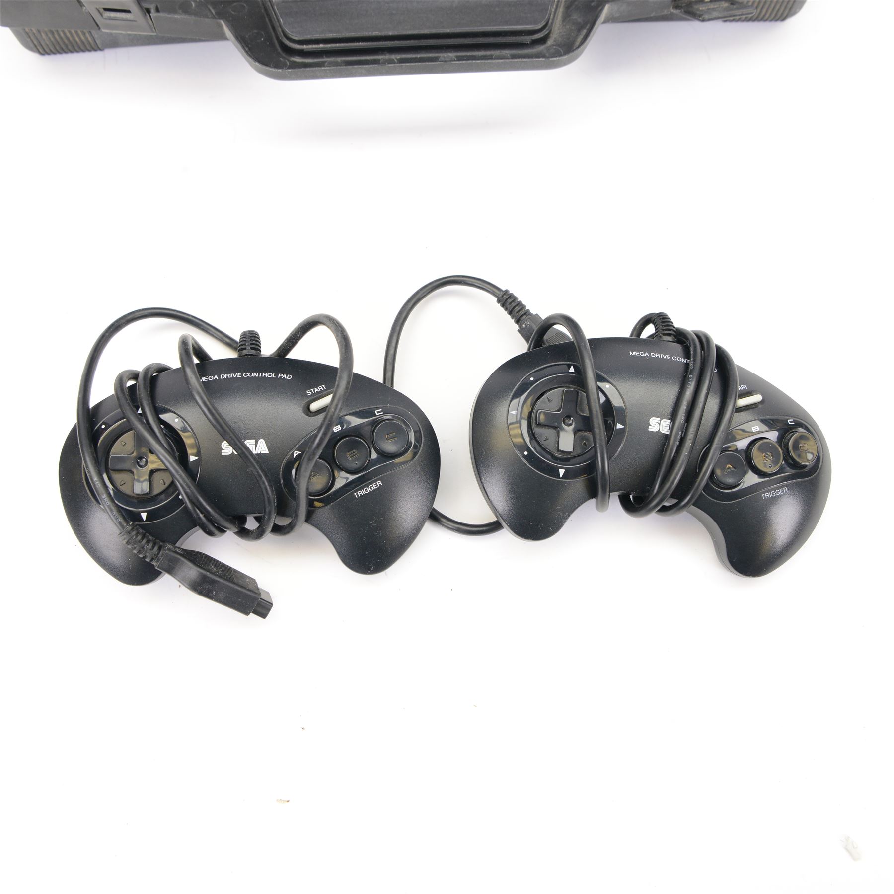 16-Bit Sega Mega Drive console with two controllers and four games, comprising Fifa 96, Sonic The Hedgehog 2, Sonic The Hedgehog Pinball and World Cup USA 94, contained within fitted plastic carrycase with instruction manual and cheats book