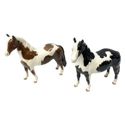 Two Beswick Pinto Ponies piebald and skewbald, no. 1373, both with impressed marks beneath 