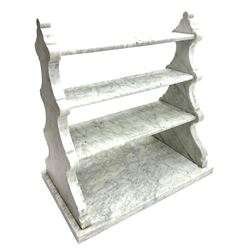 Early 20th century double sided waterfall white and black veined marble stand, three graduating tiers, scrolling solid ends on rectangular base