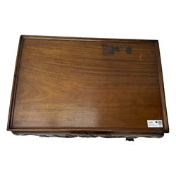 Late 19th to early 20th century mahogany side table, rectangular top with applied raised moulding, curved upper rails carved with C-scroll cartouches and extending curled leaves, bellflower carved cabriole supports with ball and claw feet 