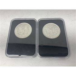 Two United States of America Morgan dollars, dated 1889 and 1921, both housed in plastic cases