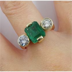 18ct gold three stone emerald and round brilliant cut diamond ring, hallmarked, total diamond weight approx 1.00 carat