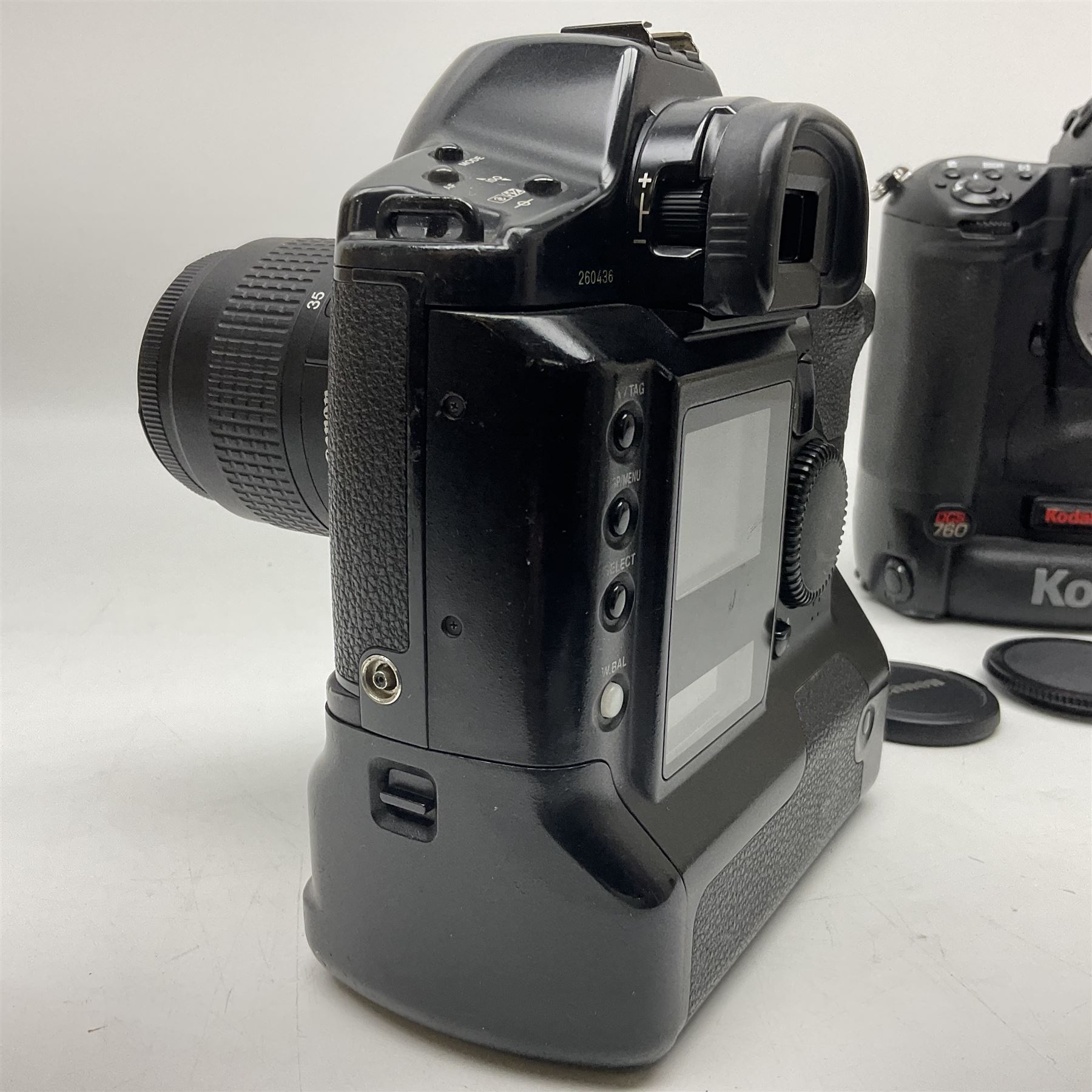 Canon EOS 1n Digital camera body, serial no. 260436, with 'Canon Zoom Lens EF 35-80mm 1:4-5.6 II Canon Inc. 52mm' lens, Kodak Professional DCS 520 digital module, and charger, serial no. K520C03165, together with Nikon F5 camera body with Kodak Professional DCS 760 digital module and charger, serial no. K760C03802