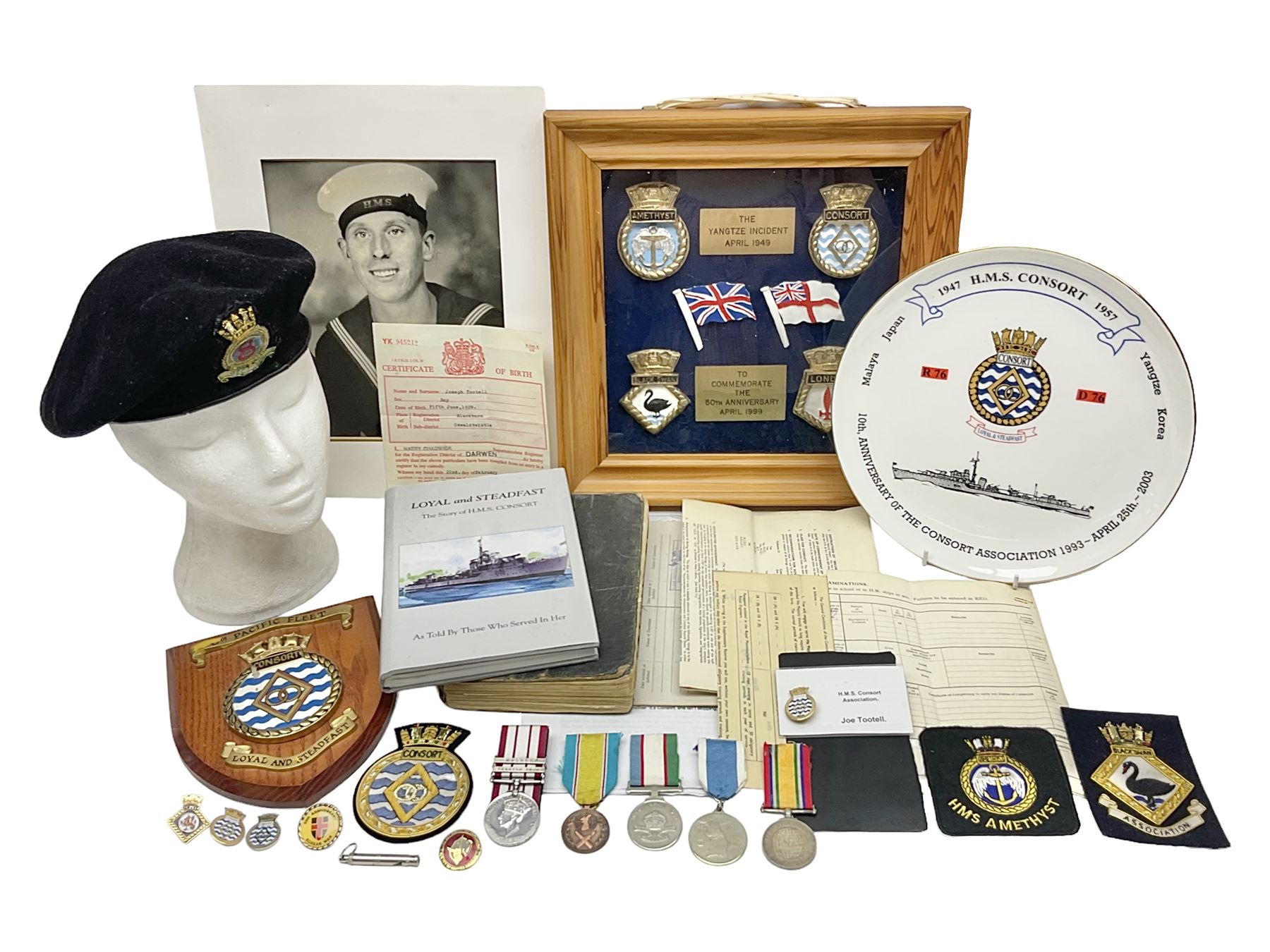 1949 Yangtze Incident HMS Consort casualty Naval General Service Medal with two clasps for Yangtze 1949 and Malaya awarded to D/SSX. 788562 J. Tootell A.B.R.N.; with four other medals comprising Republic of Korea War Service Medal, Eastern Service Medal, unofficial British and Commonwealth Occupation Forces Association Occupation of Japan medal and IFKVWA 40th Anniversary Medal; together with an archive of contemporary and later related items including Certificate of Service 1946-54, Recommendations for Advancement and Conduct Record Sheet 1946-53, Quartermasters History Sheet 1949-53, Destroyer Association China Station 1945-53 beret, later manuscript journal with his own account of the Yangtze incident etc, Joe's birth certificate details dated 1968, reprinted half-length portrait in uniform, Manual of Seamanship 1937, modern shield and framed crests, blazer badges and metal badges and a copy of Loyal & Steadfast - The Story of HMS Consort 2008, which gives details of how Joe Tootell received his wounds, the extract reads ' When Consort came under fire a short time later it was a strange, perhaps unreal experience for many of the crew who had never seen action before. Ordinary Seaman Joe Tootell was in the wheelhouse. 'I could not see the action. We could hear the ship taking severe punishment. When the wheelhouse took a direct hit, killing the coxwain, Chief Petty Officer Gurney, and myself receiving multiple shrapnel wounds, the steering mechanism was put out of action.'