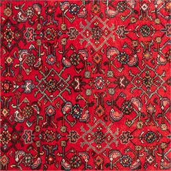 North West Persian runner, the red field decorated with an all-over Herati pattern of diamond lattice motifs, rosettes and serrated leaves, ivory floral spandrels, enclosed by an indigo palmette border and narrow floral guard bands