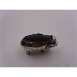Edwardian silver mounted novelty pin cushion, in the form of an elephant, with cushioned back, hallmarked Birmingham 1906, maker's mark worn and indistinct, L4cm, H3.5cm