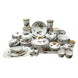 Worcester Evesham patter tea and dinner wares comprising eight dinner plates, seven dessert plates, eight bowls, six cups and saucers, eight tea plates, two covered vegetable dishes, three graduated storage jars, various serving dishes, condiments etc (64)
