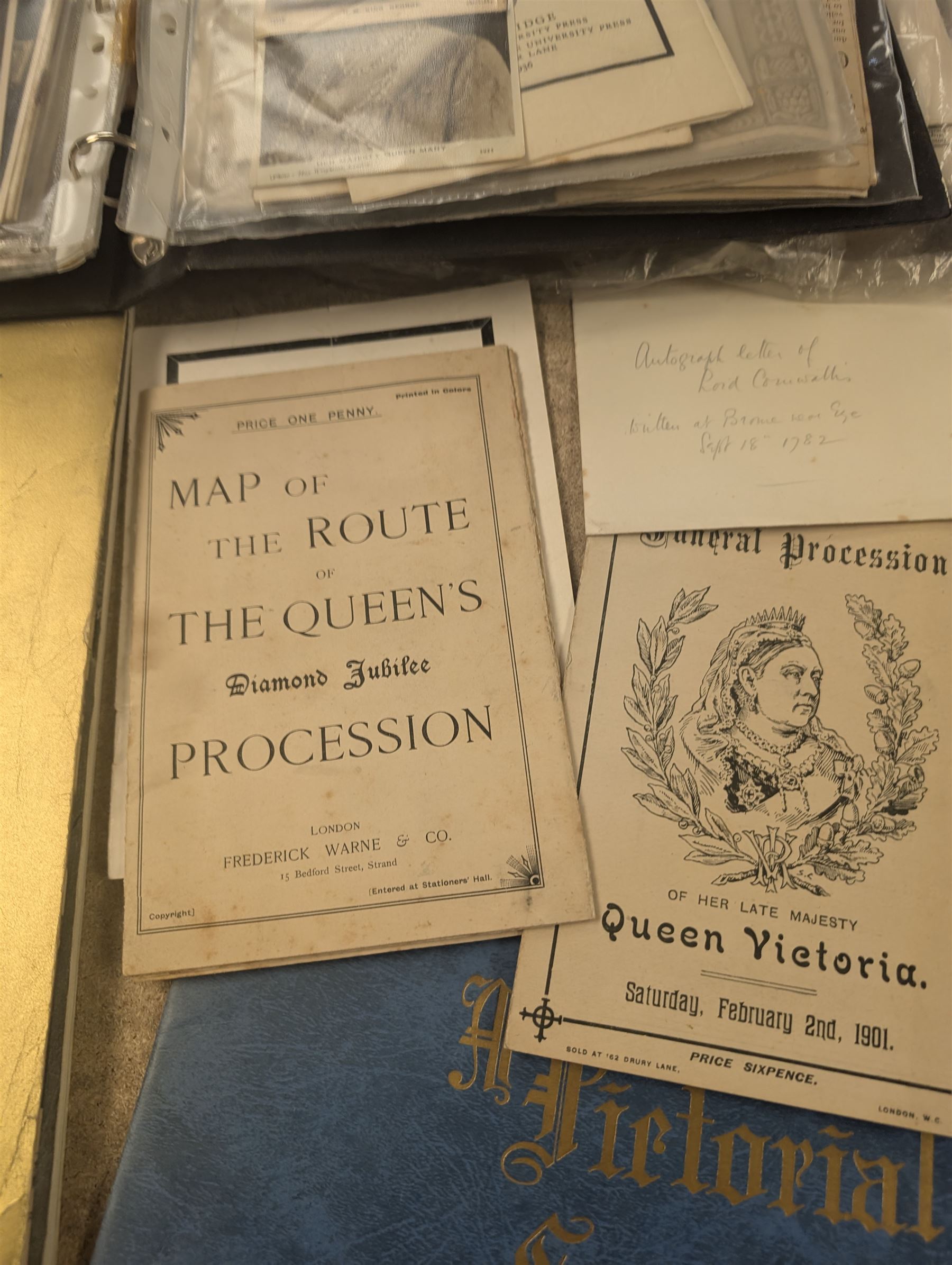 Collection of mostly Royal ephemera and commemorative memorabilia, including souvenir programmes, Royal Pedigrees, postcards, and newspaper reprints, etc, contained within a folder