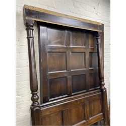17th century style oak 4' four poster bed, high panelled back with projecting canopy cornice and panelled roof, turned posts with panelled front