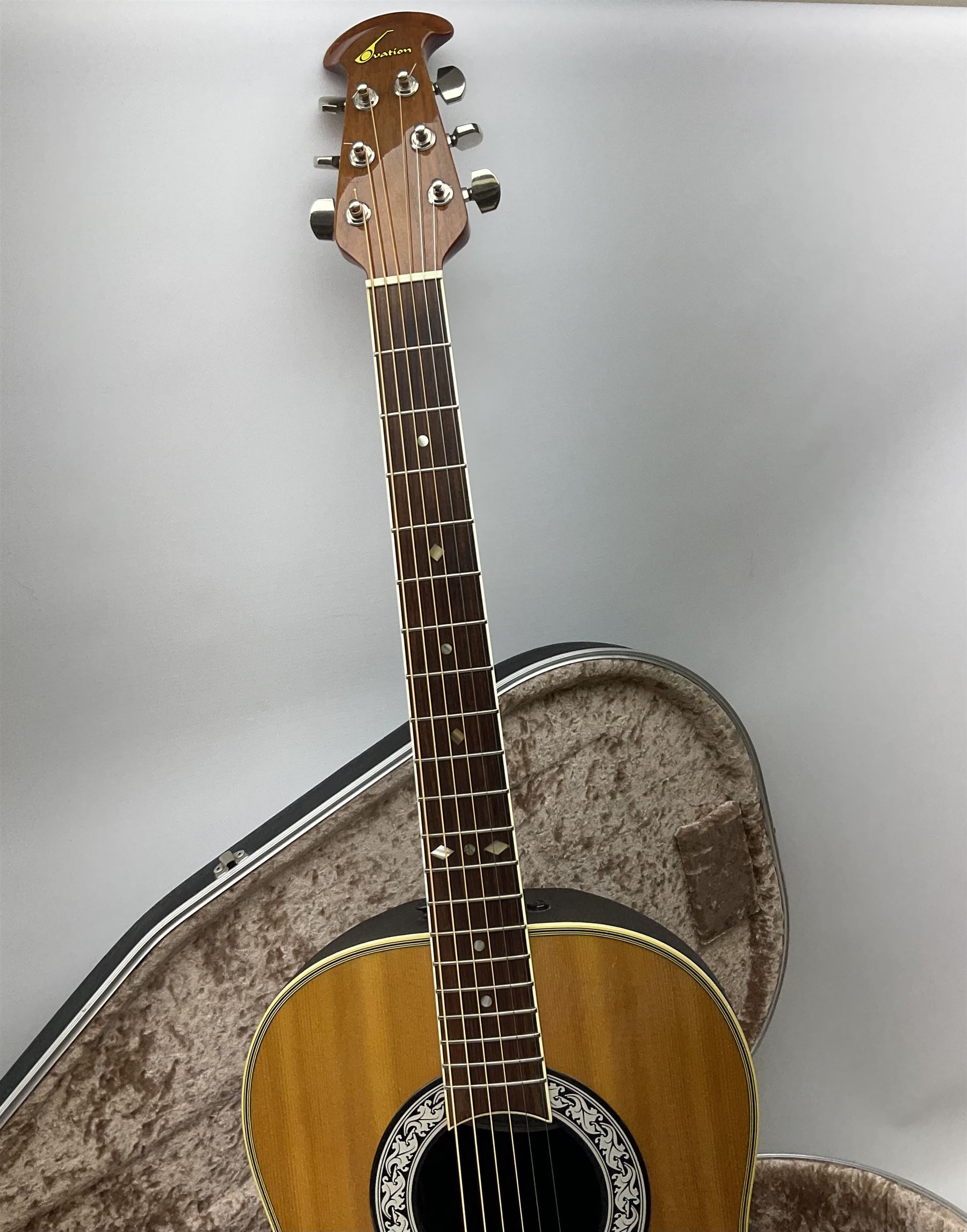 Ovation Ultra Series Model No.1512 electro acoustic guitar, 1980s/90s with textured black bowl back, natural spruce top and mahogany neck, serial no.232916 L104cm; in Hiscox Liteflite case with GuitarKes Workshop set-up and service certificate date October 2021
