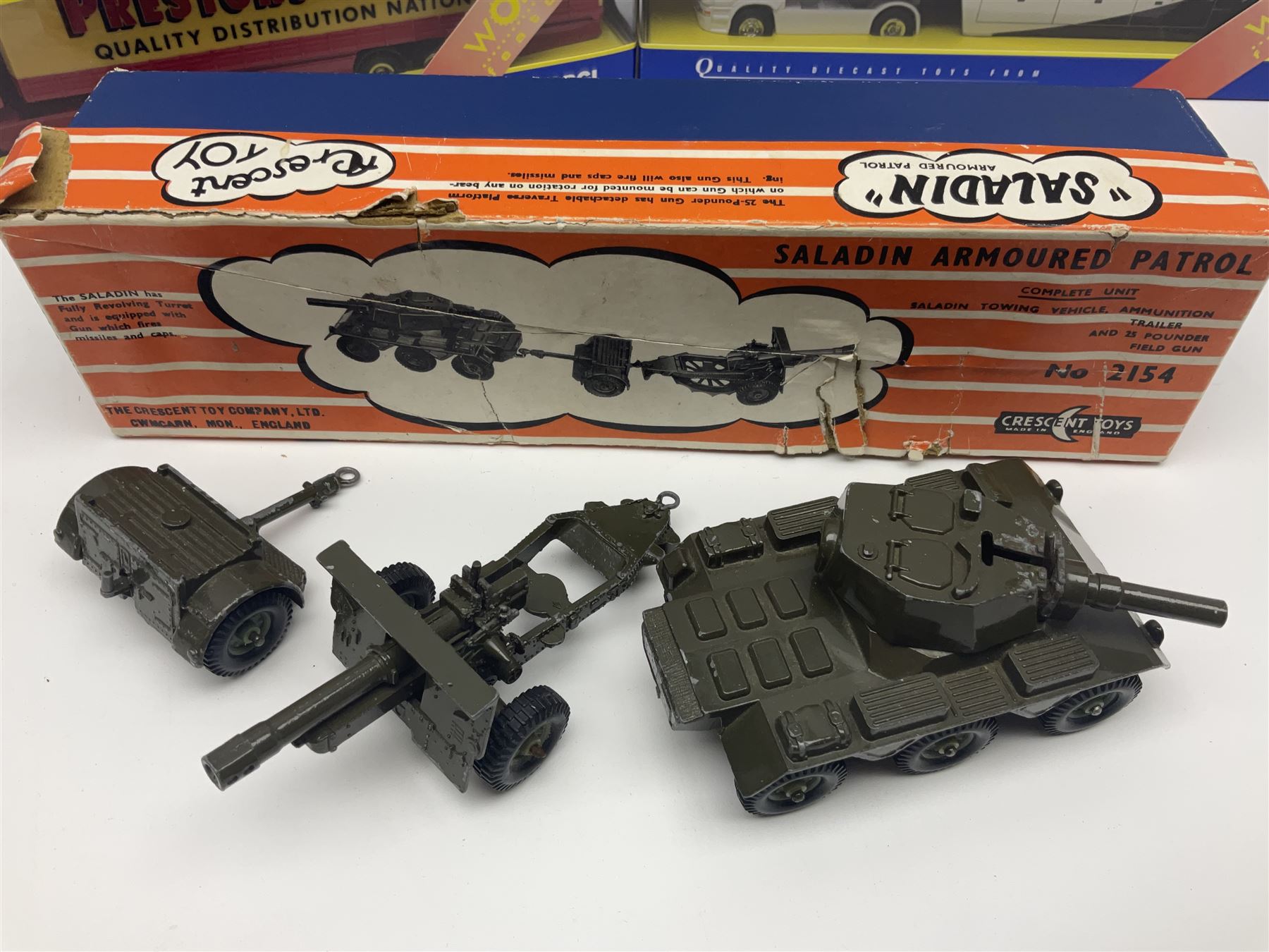 Crescent Saladin Armoured Patrol Set; boxed; unboxed Dinky Leopard Tank and American 105mm gun; two Corgi Superhaulers - TY86601 Scania Race Transporter Castrol Honda and TY86617 Scania Cutrainside Prestons of Potto; both boxed; and post-WW2 German clockwork tin-plate three-piece train set