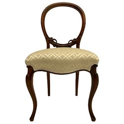 Set of six Victorian rosewood salon chairs, open balloon backs carved with foliage, fine scroll carved cabriole supports, overstuffed seats upholstered in damask fabric 