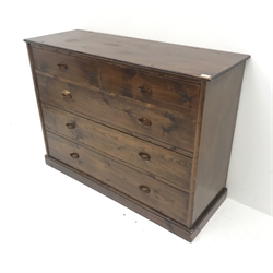 Early 20th century stained pine chest, two short and three long drawers, plinth base, W127cm, H93cm, D46cm