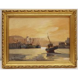 Don Micklethwaite (British 1936-): Sunset Scarborough Harbour, oil on board signed 21cm x 29cm