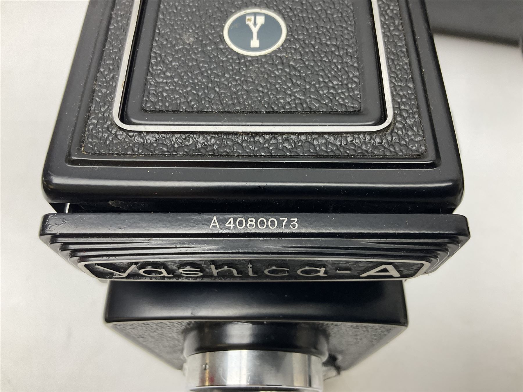 Yashica-A camera body, serial no. A4080073, with 'Yashikor 1:3.5 f=80mm' lens, serial no. 209272 and 'Yashikor 1:3.5f=80mm' lens, serial no 22942, together with Yashica TL-Electro camera body, serial no. 5054162 with 'Yashinon-DS 50mm 1:1.9  40056038