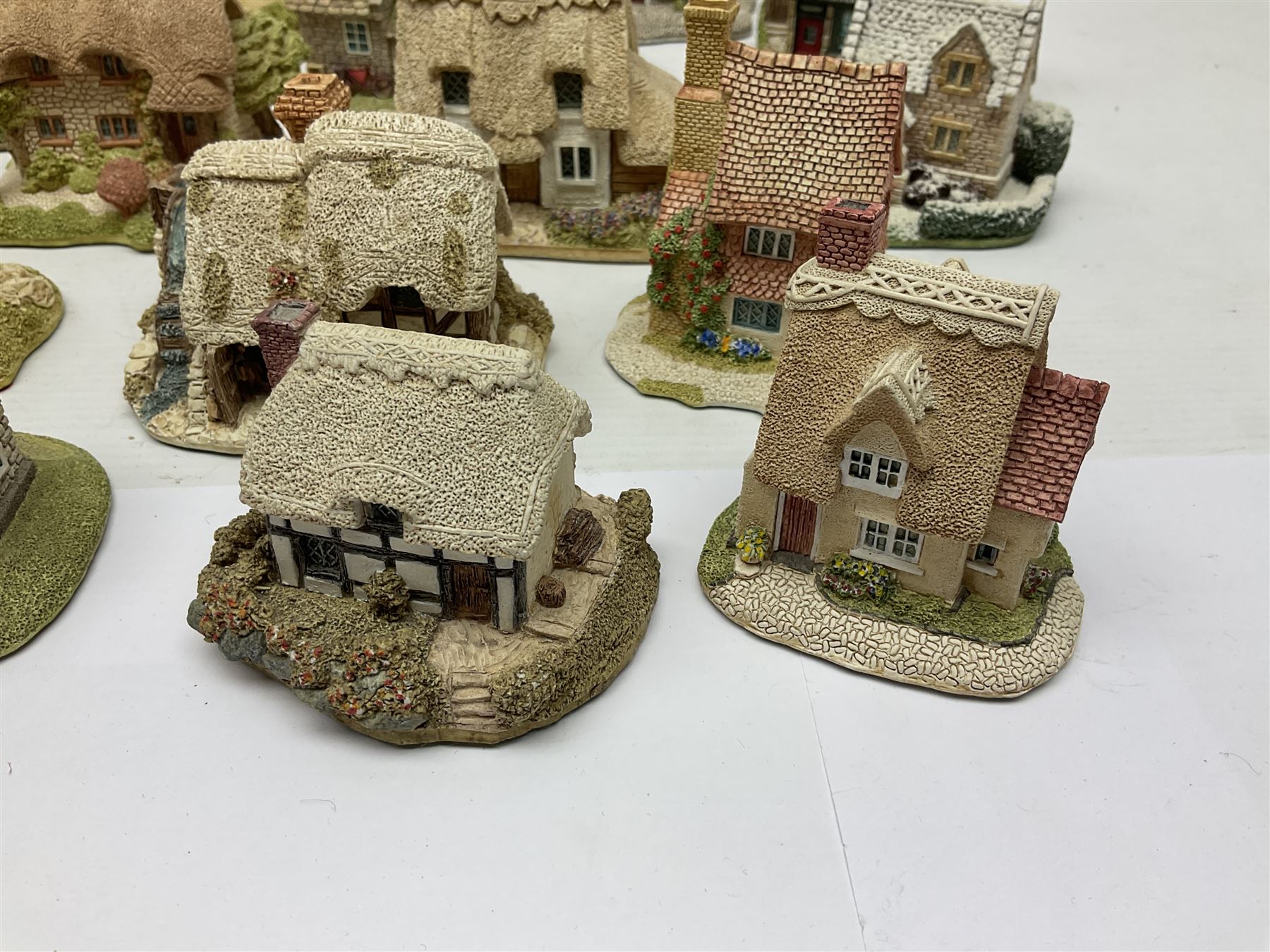 Twenty Lilliput Lanes, including The Chocolate House, Chiltern Mill, Blaise Hamlet, St Kevin Church, some with deeds and original boxes