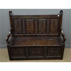  19th century oak bench, floral and mythical creatures carved back panels, hinged seat, scrolled arms with turned supports, panelled front with gothic style lozenge and guilloche carvings, stile supports, painted on top rail 'John Cousin, Old Town Hall, Wandsworh', W140cm, H120cm, D56cm  