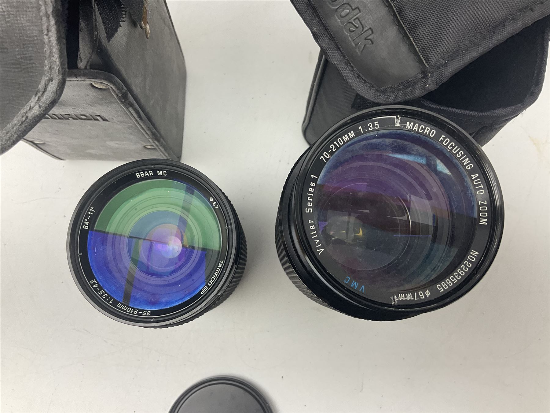 Collection of camera bodies and lenses, to include Olympus OM-1 camera body, serial no 106567, with 'Olympus OM-System F.Zuiko Auto-S 1:1.8 f=50mm' lens, serial no 135097,  Zenit-B camera body, serial no 71017867, with 'Helios-44-2 2/58' serial no 7500040, Voigtlander Vito B camera body, with 'Voigtlander Colour Skopar 1:2.8/50' lens, 'Olympus OM-System Zuiko Auto-Zoom 1:4 f=75-150mm' lens serial no 104321, 'Tamron SP 35-210mm 1:3.5-4.2' lens etc 