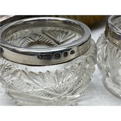 Silver backed hair brush, together with three silver lidded dressing table glass jars, to include two silver collared examples including a hobnail cut spherical example hallmarked Birmingham 1911, three silver collared cut glass jars and a pair of EPNS vases