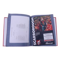 Comprehensive collection of approximately one-hundred and ninety Scarborough FC football programmes for the 1979/80, 1980/81 and 1981/82, 1982/83 seasons, all filed within eight dedicated Scarborough FC red Home and Away binders