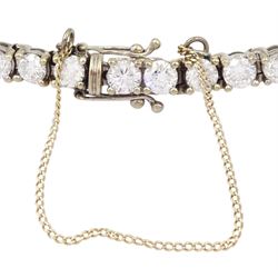 18ct white gold round brilliant cut diamond bracelet, stamped 18K, total diamond weight approx 10.80 carat