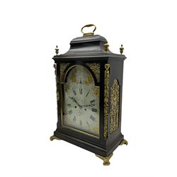 A late 18th century ebonised bracket clock retailed by William Rust, Market Place Hull c1790, case with brass handle and finials to an inverted bell top, pierced sound frets to the sides on foliate cast feet, break arch painted dial with Roman numerals, five minute Arabic's and minute track, matching steel hands and pendulum regulation to the arch, with painted depictions of gilded yellow flowers to the spandrels and conforming decoration to the arch, 8-day twin fusee movement with a recoil anchor escapement, striking the hours on a cast bell with pull repeat, movement backplate engraved “W Rust, Hull”. With pendulum. 
***William Rust 1780-1827, is recorded as a clockmaker and goldsmith. Partnered with John Shipham as Rust & Shipham 1820s, later becoming Barnby & Rust. 
